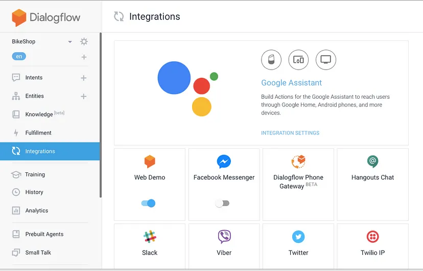 Interfaccia Dialogflow che mostra la sezione 'Integrazioni' con Google Assistant e varie opzioni di piattaforme di messaggistica come Facebook Messenger, Slack e Twitter.